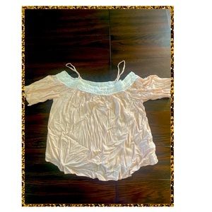 Low shoulder blouse. Light pink with a nice lace design.